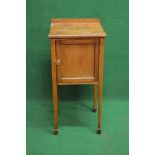 Edwardian mahogany beside cabinet the top having raised back with moulded edge over single panelled
