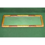 Rectangular wall mirror having gilt and painted frame with rounded corners - 43" x 14.