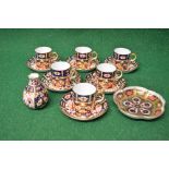 Set of six Royal Crown Derby Imari pattern coffee cans and saucers together with a shaped circular