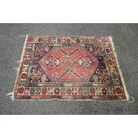 Red and blue ground rug having blue,