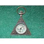 Triangular brass cased pocket watch having Masonic decoration and numbered inside 262467