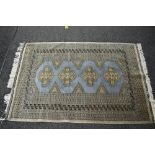 20th century blue ground rug having cream,