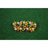 Italian 18ct gold and pearl set brooch in the form of flower buds and leaves with some leaves