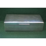 Rectangular silver cigarette box opening to reveal wooden lined interior with adjustable dividing