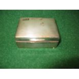 Silver cigarette box the lid having engine turned decoration and engraved with the initials KEK,