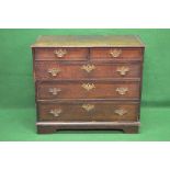 18th century oak chest of two short and three long graduated drawers having brass drop handles and