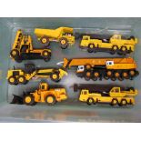 Seven metal and plastic models of construction machinery by Majorette, Corgi and Joal,