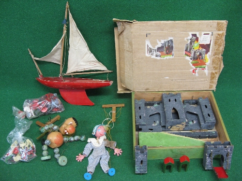 Wooden fort with draw bridge and bags of plastic figures,