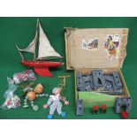 Wooden fort with draw bridge and bags of plastic figures,
