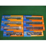 Eight Roco (Austria) HO scale German Railways coaches in green, blue and silver liveries,