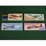 Four flying balsa and tissue model aircraft kits made by Guillows,