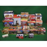 Two boxes containing thirteen Hornby OO scale Skaledale pre-made model buildings to include: oast