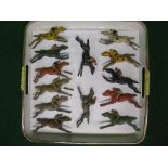 Tray of metal race horses and jockeys