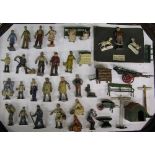 Tray of metal farm figures, huts, sign posts, barrows, benches,