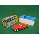 Triang-Scalextric Aston Martin DB4 GT with driver in red livery,