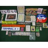 Quantity of bus and tube related ephemera to include: buttons/badges, tickets, leaflets, signs.