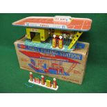 Mettoy tinplate Shell filling station with roof ramp and two petrol pumps,