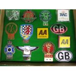 Tray of car badges etc to include: AA New Zealand (square), BMA, Brooklands School Of Flying Ltd,