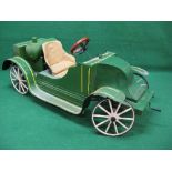 Large bespoke steel pedal car based on a Veteran car with solid tyred wooden spoked wheels,