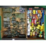 Two boxes of approx fifty five items of diecast model vehicles and military equipment from Dinky,