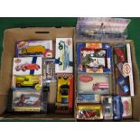 Two boxes of boxed diecast or plastic model vehicles in various scales by Corgi, 1990's Dinky, Siku,