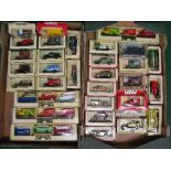 Two boxes of Lledo Models to include: seven Gold vehicles,