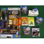 Quantity of boxed tv and film toys based on James Bond, Star Wars, Muppets, Noddy,