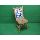 Late 19th/early 20th century wooden shop chair with rear enamel advertising panel for Watsons
