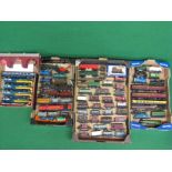 Four boxes of over seventy items of loose playworn OO scale rolling stock from Hornby, Triang,