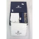 Boxed Swarovski gift pack to include crystals, gloves, cleaning cloth, booklet etc