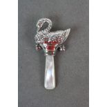 Silver and mother of pearl babies rattle in the form of a swan