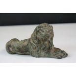 Patinated bronze figure of a recumbent lion