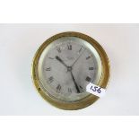 Bulkhead style Brass cased Clock with silvered dial marked "Marpro", approx 11cm in diameter &