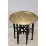 Indian Brass Top Table on Turned Wooden Folding Base, 60cms diameter x 55cms high