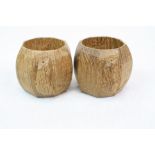 Pair of "Mouseman" carved Oak Napkin rings, each approx 4.5cm diameter