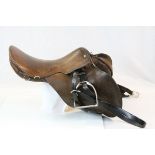 20th century leather saddle with straps