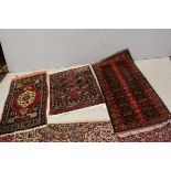 Three Small Red Ground Wool Rugs / Runners