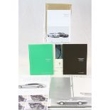 Six vintage Aston Martin sales brochures to include; Rapide, V8 Vantage, Virage & DB9