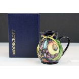 Boxed Moorcroft Pottery ' Queens Choice ' Pattern Jug, impressed and printed marks