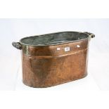 Large twin handled Copper pot with silvered interior, measures approx 67 x 32 x 32cm including the