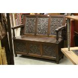 Oak Monk's Bench with Carved Panels and Hinged Lid to Box Seat, 119cms wide