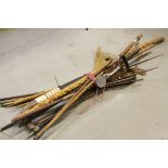 Collection of walking sticks and tribal items