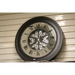 Large Quartz wall Clock with moving cog action & marked "Champs - Elysees France Paris", approx 80cm