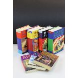 Seven First Edition Harry Potter Books including Paperback Chamber of Secrets, Prisoner of Azkaban