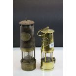 Two vintage Miner's Lamps to include "The Protector" plus a metal & brass example by "E Thomas &
