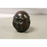 Bronze four faced Buddha paperweight