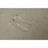 Pair of silver and cz drop earrings