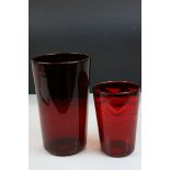 Two Whitefriars ruby ribbed tumbler vases, shape designed by Marriott Powell circa 1930. Ruby