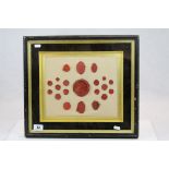 Framed and glazed set of 19th century wax seals