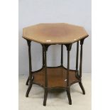 Early 20th century Inlaid Mahogany Octagonal Centre Table raised in Eight Slender Turned Legs united